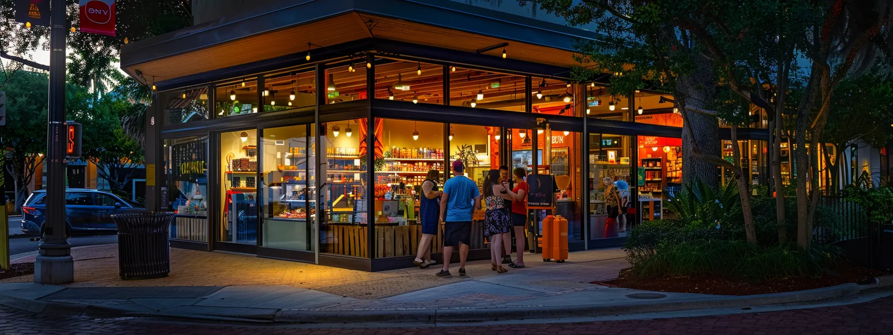 a bright and welcoming storefront in melbourne, fl with happy customers interacting with the staff.